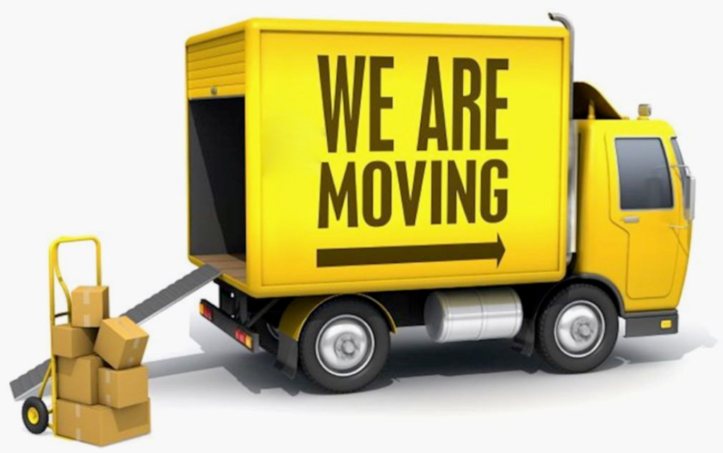 Moving Truck with message saying we are moving and moving boxes